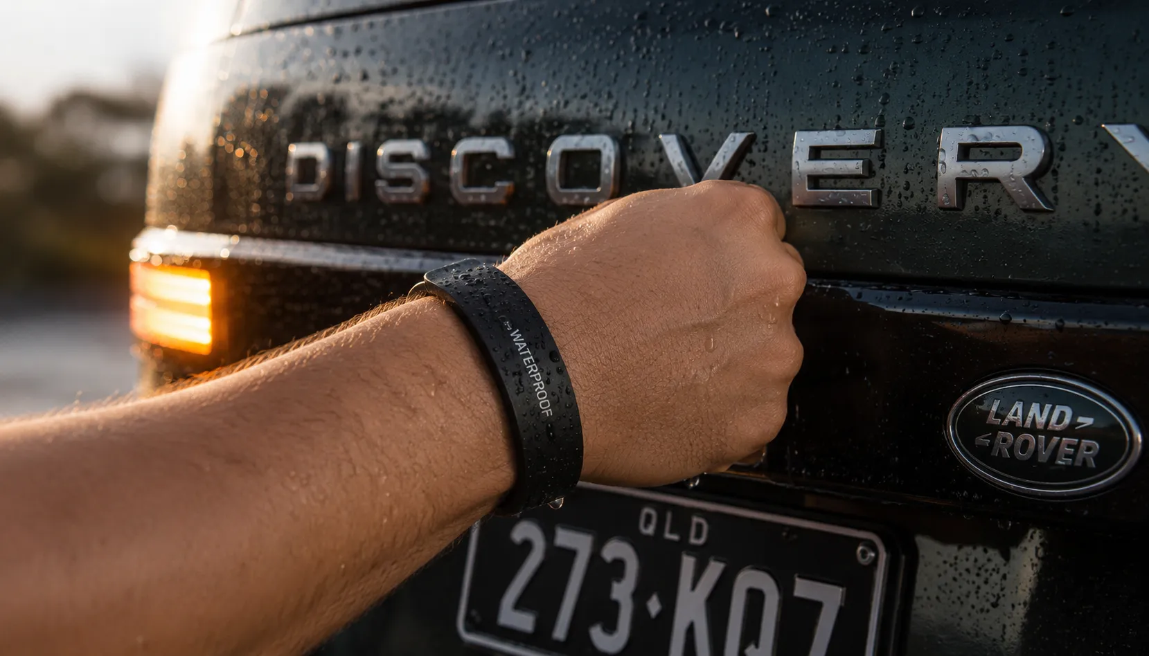 How the Activity Key Actually Works Activity Key wristband unlocking a Land Rover Discovery tailgate in Brisbane