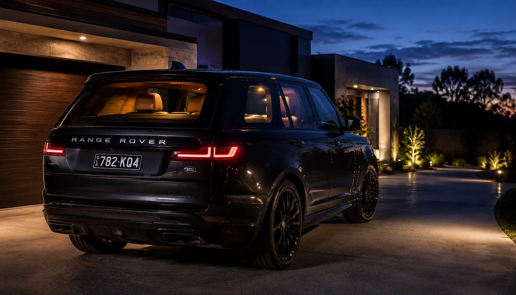 Ready for the Drive Home to Look Like This Range Rover with glowing ambient interior lighting in a Brisbane driveway at dusk