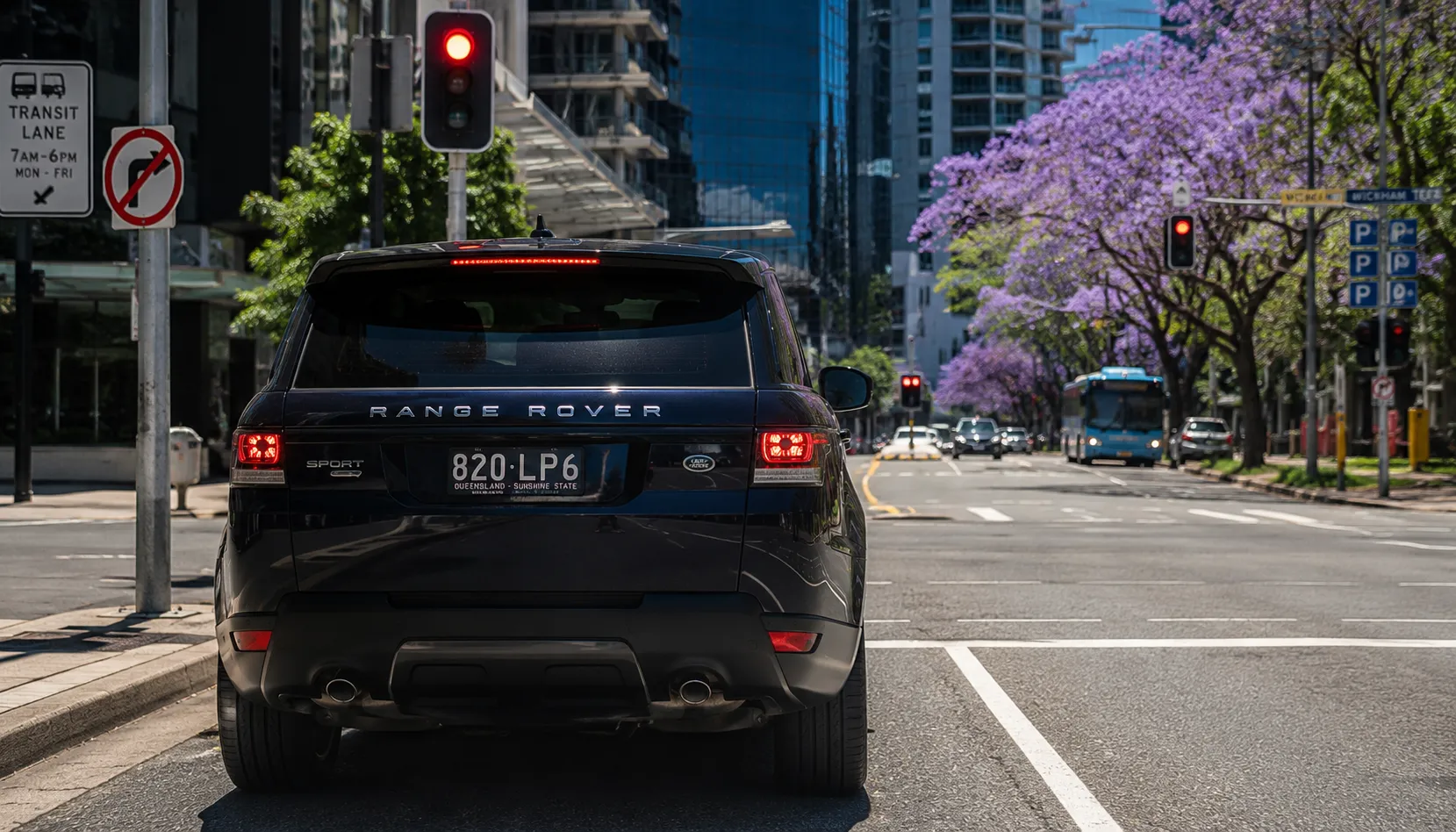 The Part Nobody Prints Range Rover Sport idling at Brisbane traffic lights in summer after stop/start deactivation